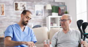 https://www.magnific.com/free-photo/caucasian-young-doctor-nursing-home-giving-pills-senior-man-with-crutches_28837898.htm#fromView=search&page=1&position=29&uuid=a6fd8fee-c9ac-4451-9daa-a583eac0fde4&track=ais_hybrid&query=care+taker