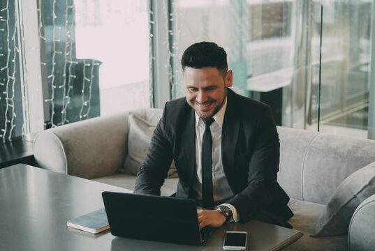 https://www.pexels.com/photo/businessman-working-on-laptop-in-modern-office-36766664/