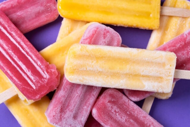 Red strawberry popsicles and yellow popsicles on purple background https://www.magnific.com/free-photo/red-strawberry-popsicles-yellow-popsicles_418017717.htm#fromView=search&page=1&position=10&uuid=c97ccc4a-2a21-4c53-b4dd-b72493feb1a4&track=ais_hybrid&query=icr+pops