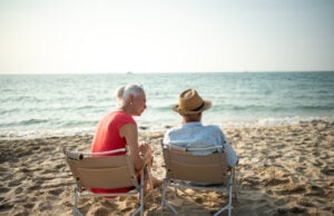 The New Standard for Smarter Retirement Income https://www.vecteezy.com/photo/22458909-a-couple-of-elderly-sitting-in-chairs-at-the-beach-watching-the-sun-and-the-sea-on-their-summer-vacation-and-they-smile-and-enjoy-their-vacation