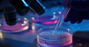 Researchers Discover Immune ‘Off Switch’ Used By Cancer Cells https://www.vecteezy.com/photo/72701838-a-gloved-hand-uses-a-pipette-to-drop-liquid-onto-a-petri-dish-under-a-microscope-the-dish-contains-a-pink-liquid-and-there-are-several-other-dishes-nearby