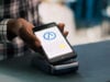 https://www.vecteezy.com/photo/39434353-african-american-man-putting-mobile-phone-on-pos-terminal-paying-for-fashionable-clothes-in-boutique-after-discussing-items-material-with-worker-man-standing-at-retail-store-counter-in-clothing-store