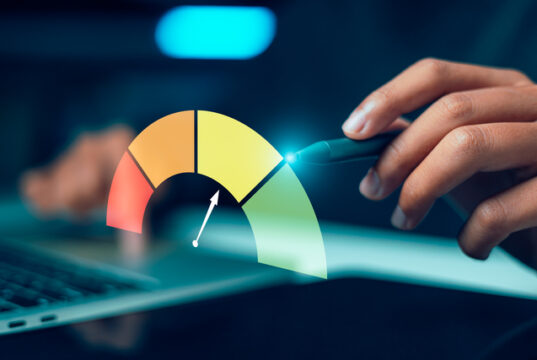 https://www.vecteezy.com/photo/82243113-businessman-hand-holding-stylus-pen-pointing-at-a-colorful-virtual-rating-gauge-meter-on-laptop-representing-credit-score-assessment-risk-management-or-performance-kpi-audit