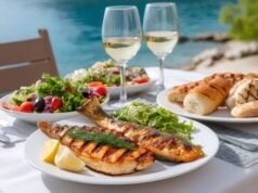 https://www.vecteezy.com/photo/65379136-grilled-fish-with-salad-and-white-wine-enjoying-sea-view-in-a-luxury-restaurant