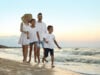 https://www.vecteezy.com/photo/82208884-happy-family-walking-on-sandy-beach-near-sea-at-sunset