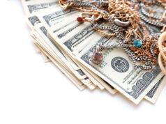 https://www.vecteezy.com/photo/12304726-many-expensive-golden-and-silver-jewerly-rings-earrings-and-necklaces-with-big-amount-of-us-dollar-bills-on-white-background-pawnshop-or-jewerly-shop