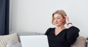 https://www.vecteezy.com/photo/16728463-middle-aged-woman-in-elegant-clothes-is-at-home-with-laptop