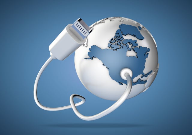 Computer cable and plug connects to USA on world globe. Concept for how users in United States download data, connect to the internet and social media. https://www.vecteezy.com/photo/6932988-multiple-versions-of-data-plugs-being-plugged-into-north-america-usa
