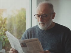 https://www.vecteezy.com/photo/67965612-senior-man-reading-newspaper-in-cozy-home-with-natural-light-and-calm-expression