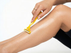 https://www.vecteezy.com/photo/79375063-woman-shaving-her-leg-with-a-bright-yellow-razor