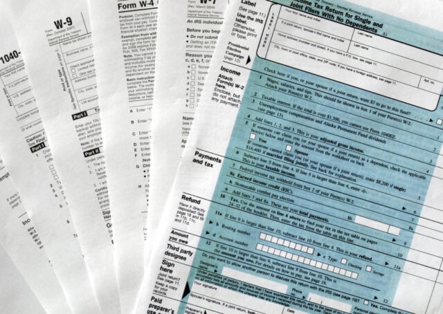 https://www.magnific.com/premium-photo/usa-tax-forms_18132854.htm#fromView=detail&position=8&uuid=53fb9149-d9cc-46da-ad30-f38b9277ccf1&track=ais_hybrid&from_element=cross_selling__photo
