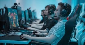 https://www.vecteezy.com/photo/69648931-focused-male-gamer-in-striped-shirt-playing-in-a-competitive-esports-environment