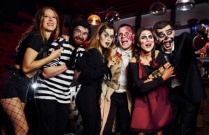 Why Has Halloween Become So Popular Among Adults? https://www.vecteezy.com/photo/15244730-friends-is-on-the-thematic-halloween-party-in-scary-makeup-and-costumes-have-fun-and-posing-for-the-camera-together