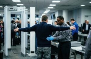 Say Goodbye at the Gate: TSA Reopens Terminals to Non-Ticketed Visitors https://www.vecteezy.com/photo/76677302-passenger-undergoing-a-security-pat-down-by-a-tsa-agent-at-an-airport-checkpoint