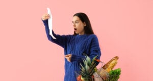 https://www.vecteezy.com/photo/86707675-shocked-young-woman-with-shopping-basket-and-receipt-from-store-on-pink-background