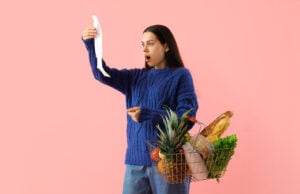 https://www.vecteezy.com/photo/86707675-shocked-young-woman-with-shopping-basket-and-receipt-from-store-on-pink-background