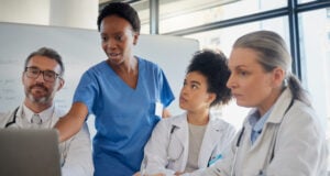 https://www.vecteezy.com/photo/76051845-teamwork-healthcare-and-planning-with-a-doctor-nurse-and-medicine-team-at-work-on-a-laptop-during-a-meeting-collaboration-research-and-insurance-with-a-medical-group-working-in-the-hospital