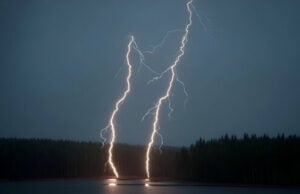 Fatal Florida Lightning Incident Highlights How Quickly a Lightning Threat Can Develop (Video) https://www.vecteezy.com/photo/72919060-two-powerful-lightning-bolts-strike-a-dark-lake-reflecting-light-against-a-dense-forest-at-night