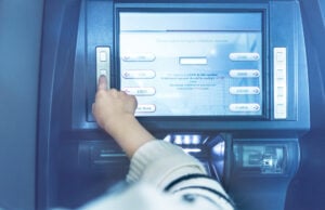 Are Sneaky Checking Account Fees Eating Away at Your Hard-Earned Money? https://www.magnific.com/free-photo/atm-operation-bank_1286423.htm#fromView=search&page=1&position=6&uuid=93644ff6-9ddd-4902-accf-462b70b1bd17&track=ais_hybrid&query=person+bank+machine