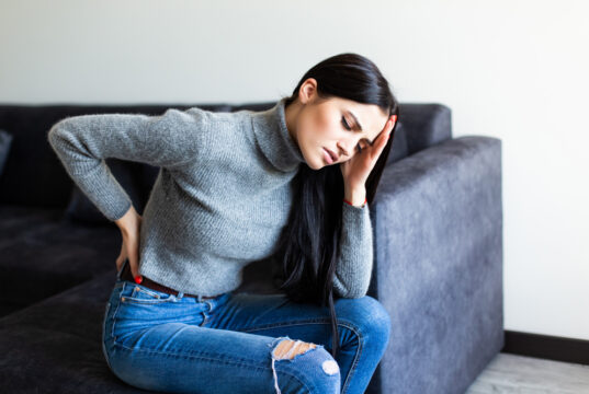 https://www.magnific.com/free-photo/young-woman-suffering-back-ache-complaining-sitting-couch-living-room-home_8472695.htm#fromView=search&page=1&position=0&uuid=67fb06e7-e588-4c23-b12c-8d6b56c231fb&track=ais_hybrid&query=woman+sitting+in+pain