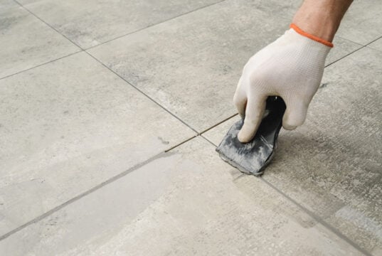 https://www.magnific.com/premium-photo/grouting-ceramic-tiles-tilers-filling-space-tiles-using-rubber-trowel_18972392.htm#fromView=detail&position=2&uuid=9eca5767-a3f3-4338-b76b-4b544689a733&track=ais_hybrid&from_element=cross_selling__photo