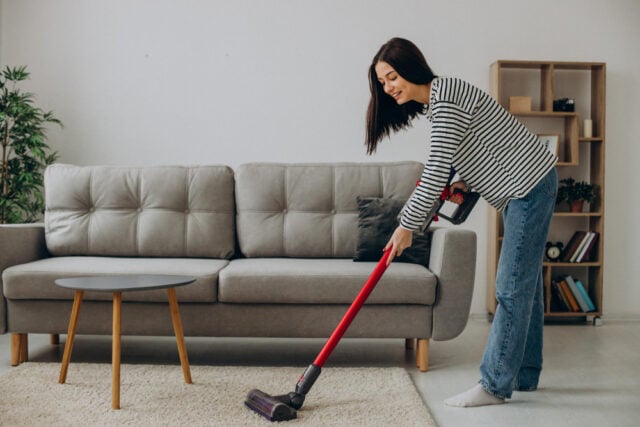 30057 https://www.magnific.com/free-photo/woman-doing-house-work-with-rechargeable-vacuum-cleaner_21934152.htm#fromView=search&page=1&position=10&uuid=7f646909-bcea-4cd3-b1bd-423344bed644&track=ais_hybrid&query=vacuuming