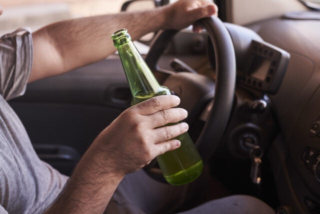 https://www.magnific.com/free-photo/bottle-beer-man-s-hands-driving-car-daytime_17248912.htm#fromView=search&page=1&position=0&uuid=e28bb6bf-f3ca-42a0-810b-4c6be3709297&track=ais_hybrid&query=drunk+driver