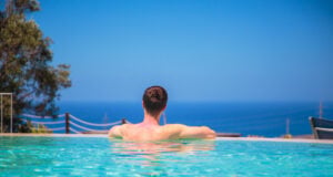 https://www.magnific.com/free-photo/caucasian-young-man-infinity-pool-watching-ocean-view-relaxing-enjoying-his-life_18812532.htm#fromView=search&page=1&position=3&uuid=d1ba3dd4-5dc8-4011-a3a7-5e81d487046f&track=ais_hybrid&query=infinity+pool