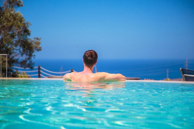 https://www.magnific.com/free-photo/caucasian-young-man-infinity-pool-watching-ocean-view-relaxing-enjoying-his-life_18812532.htm#fromView=search&page=1&position=3&uuid=d1ba3dd4-5dc8-4011-a3a7-5e81d487046f&track=ais_hybrid&query=infinity+pool