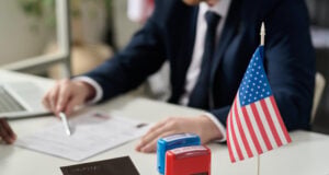 https://www.magnific.com/premium-photo/close-up-approved-rejected-stamps-table-us-immigration-office-with-flag-copy-space_35636533.htm#fromView=search&page=1&position=17&uuid=9c0e4cf2-a542-4223-91fe-12a8d4d60f5f&track=ais_hybrid&query=E-1+Visa+lawyer