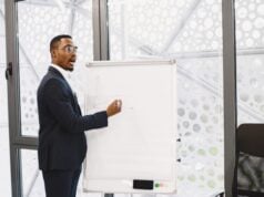 https://www.pexels.com/photo/businessman-presenting-on-a-flipchart-in-an-office-6285120/
