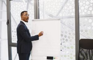 What Does a Business Coach Cost, and What Do You Get https://www.pexels.com/photo/businessman-presenting-on-a-flipchart-in-an-office-6285120/
