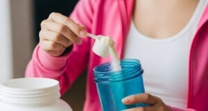 https://www.vecteezy.com/photo/78356895-a-woman-is-holding-a-bottle-of-protein-powder