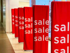 How to Spot Fake Online Sales and Always Score Real Discounts https://www.vecteezy.com/photo/74091690-bright-red-sale-banners-attract-shoppers-in-a-busy-mall