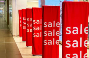 How to Spot Fake Online Sales and Always Score Real Discounts https://www.vecteezy.com/photo/74091690-bright-red-sale-banners-attract-shoppers-in-a-busy-mall