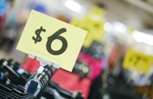 The Hidden Polyester Tax: Why Shoppers Are Paying Premium Prices for Cheap Fabric https://www.vecteezy.com/photo/13944672-close-up-of-sale-sign-in-a-closing-store