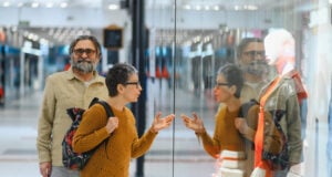 Can Holiday Cheer Survive This Year’s Heavy Wallet Pinch? https://www.vecteezy.com/photo/78812790-senior-couple-window-shopping-at-modern-mall-looking-at-store-display