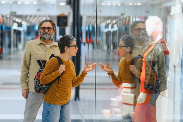 Senior couple window shopping at modern mall looking at store display https://www.vecteezy.com/photo/78812790-senior-couple-window-shopping-at-modern-mall-looking-at-store-display