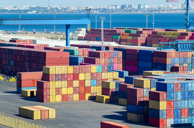 Stacked cargo containers in storage area of freight sea port https://www.vecteezy.com/photo/73102415-stacked-cargo-containers-in-storage-area-of-freight-sea-port