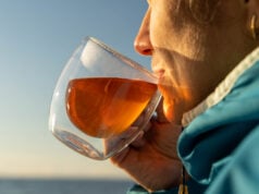 Drinking This Much Tea Daily May Help Protect Your Heart, Study Finds https://www.vecteezy.com/photo/52106409-woman-is-holding-a-steaming-cup-of-tea-or-coffee-in-a-double-walled-glass