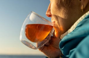 Drinking This Much Tea Daily May Help Protect Your Heart, Study Finds https://www.vecteezy.com/photo/52106409-woman-is-holding-a-steaming-cup-of-tea-or-coffee-in-a-double-walled-glass
