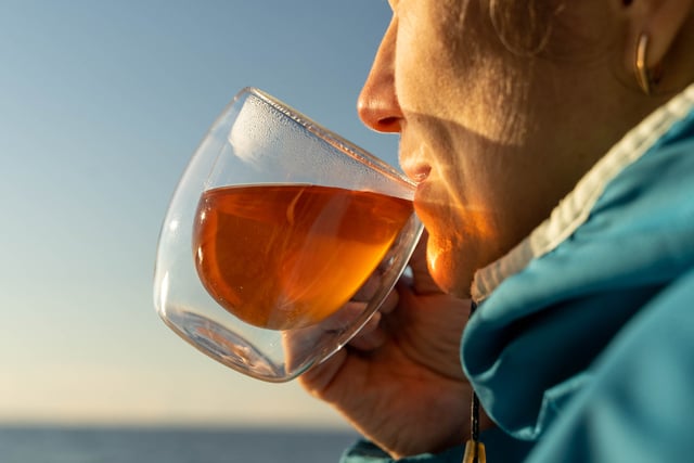 https://www.vecteezy.com/photo/52106409-woman-is-holding-a-steaming-cup-of-tea-or-coffee-in-a-double-walled-glass