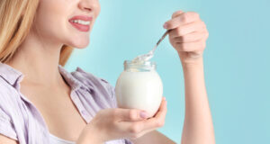 https://www.vecteezy.com/photo/87274346-young-woman-appears-in-with-yogurt-on-color-background-tropical