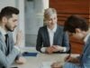 https://unsplash.com/photos/business-people-signing-a-contract-at-a-table-iPheGw7_UaI